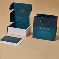 Boîte de papier d'emballage de cosmétiques unique en carton ondulé imprimé personnalisé boîte d'emballage cadeau de ensemble de produits de soins de la peau avec sac en papier