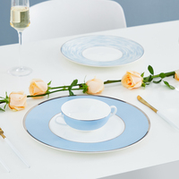 Ensembles de vaisselle de Style chinois assiette de chargeur nordique bol de nourriture plat à beurre ensemble de théière en porcelaine ensemble d'assiettes à manger assiettes de restauration