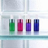 Petit flacon compte-gouttes en verre avec bouchon coloré, flacon d'échantillon cosmétique vide, format voyage, vente en gros, fournisseur OEM ODM