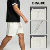 Shorts en tricot matelassé pour homme, couleur crème, taille élastique avec cordon de serrage, poches fendues, coupe ample, longueur mi-cuisse, pour la terrasse