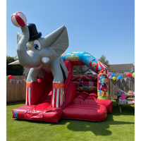 Château gonflable d'éléphant de cirque avec toboggan pour événements extérieurs, idéal pour la location en gros