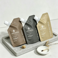 Pochette souple personnalisée biodégradable blanche de haute qualité pour shampoing avec bec verseur