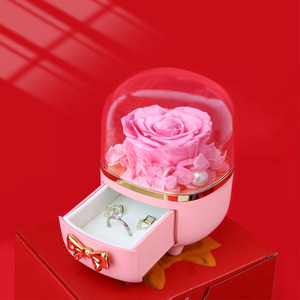 Caja de Regalo y Joyería Navideña Cilíndrica y Elegante con Diseño de Flor Eterna - Product Image 1