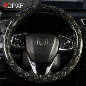 Nuovo modello antiscivolo che assorbe il sudore Versatile per tutte le stagioni di lussuosa copertura del volante per auto - Product Image 4