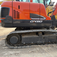 Vente Flash : Excavatrice sur chenilles Doosan DX60 d'occasion, 6 tonnes, système hydraulique complet, bon état, livraison rapide, expédition mondiale