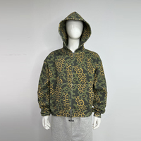 Fabricants de vestes réversibles amples personnalisées à double couche avec imprimé léopard, coupe ample, à capuche zippée