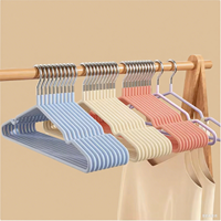 Support suspendu pour vêtements secs Cintre noir pour vêtements pour adultes Cintres en plastique + métal Organisateur de vêtements pour la maison