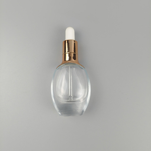 Proveedor ODM/OEM, Botella de Vidrio Transparente Cilíndrica de 20ml/30ml para Cosméticos con Gotero Dorado de PP - Product Image 2