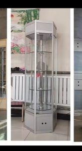Estante de exhibición de pared de venta al por menor de Metal rodante de 4 paneles, soporte de rejilla de vidrio para tienda, exhibición de arte artesanal, vitrina plana de fácil rotación - Product Image 4