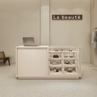 Comptoir de réception moderne et minimaliste avec vitrine en verre, comptoir de caisse de luxe pour boutique de vêtements
