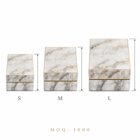 Boîte cadeau en papier marbré de luxe OEM ODM, boîte d'emballage rigide en carton avec logo en feuille d'or personnalisé, ensemble de deux pièces pour vêtements, cadeaux de luxe