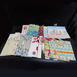 SP3014 Christmas <b>Gift</b> Paper Bags Come With Greeting Cards and Handles of Various Materials - Product Image 3