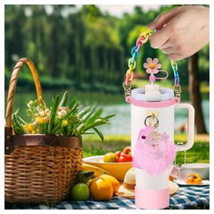 Bộ phụ kiện cho cốc Stanley bao gồm quai cầm chai, nắp đậy ống hút, móc khóa, vỏ son dưỡng môi và móc treo nhỏ. - Product Image 2
