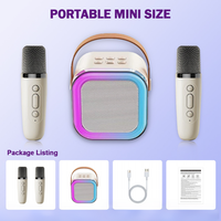 Altavoz de Karaoke Portátil Mini K12 para Niños, Luz RGB, Dos Micrófonos, Audio Inalámbrico BT, Batería de 10W, para Cine en Casa y Canto al Aire Libre