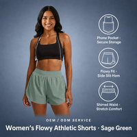 Shorts de sport fluides vert sauge pour femme, coupe ample, rangement sécurisé, confort extensible, poche pour téléphone, OEM ODM, partenaire d'usine