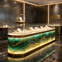 Vitrine de luxe pour bijoux avec compartiments de rangement, dotée de pierre artificielle translucide et d'éclairage LED