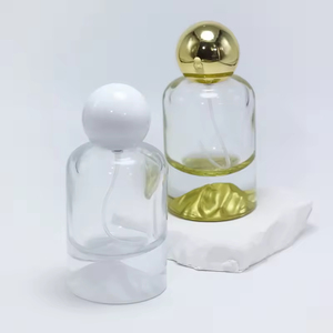 Botellas de Perfume de Vidrio Cilíndricas de 30ml, 50ml y 100ml con Base Dorada, Plateada, Azul, Roja y Verde para Regalo o Fragancia - Product Image 6