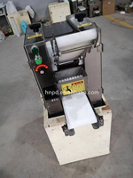 Machine automatique de fabrication de disques d'empanadas, de ruti, de roti, de chapati, de gyoza, de peau de dumpling, de tortilla de farine