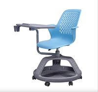 Chaise d'étude moderne à prix réduit avec accoudoirs en plastique confortables et tablette pliable pour l'école et l'appartement