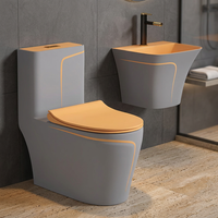 Ensemble WC monobloc noir de luxe et lavabo suspendu, WC en céramique à poser au sol avec ligne dorée pour salle de bain