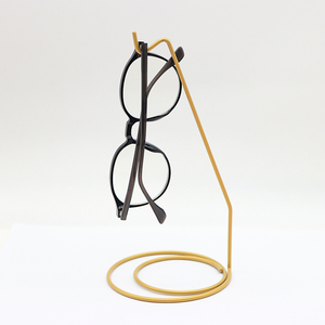 Kreativer Metall-Brillenhalter und Schlüsselaufbewahrung in Bananenform für Wohnzimmer-Dekoration und Aufbewahrungslösungen - Product Image 2