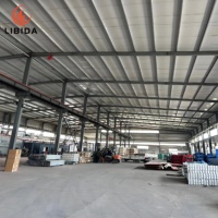 Kits de hangar en acier modernes à ossature métallique pour entrepôts à grande portée et à structure en acier de grande hauteur
