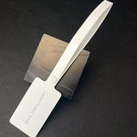 Joint d'étiquette d'étiquette d'habillement en caoutchouc souple PVC personnalisé boucle anti-usure anti-ajustement jetable imprimé découpé au laser