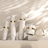 Emballage de soins de la peau de luxe haut de gamme, flacons en verre cylindriques de 100 ml de haute qualité avec pompe pour sérums cosmétiques, diffuseurs