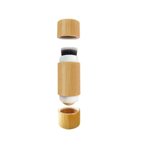 Rouleau 2 en 1 à double tête absorbant l'huile pour le visage Rouleau volcanique en bambou avec rouleau en quartz rose pour le massage des yeux et du visage