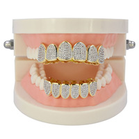 Nouvelle vente en gros de dents dorées pour hommes, Hip Hop, Grillz, Top et bas glacés, dents en zircone cubique, Vampire, personnalisé, 2022
