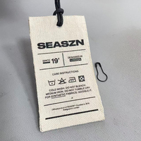 Étiquette personnalisée en toile de coton naturel épaisse avec logo et nom, à faible MOQ, avec cordon et œillet métallique, pour vêtements