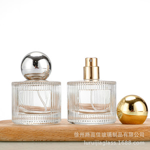 Factory direct stock of 50ml vertical striped perfume bottles with push-<b>button</b> clasp, cosmetic spray dispensers, sample-sized - Product Image 1