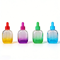 Vente en gros de flacons en verre ronds bleus dégradés de 50 ml - Contenant vide pour huile essentielle avec logo personnalisé et compte-gouttes en caoutchouc