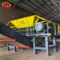 Kowloon Machinery Dubbelassige Biomassa Shredder voor Kokosnootschil, Rijststro, Palmolievezels, Hoge Productiviteit Motor & Motorblok