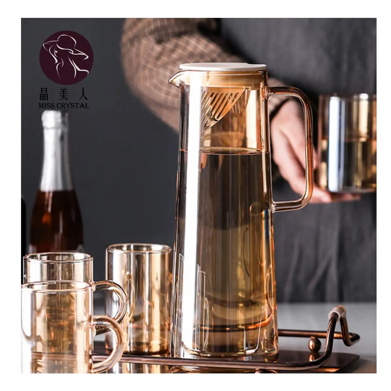 Zarif tasarım Amber cam sürahi isıya dayanıklı cam çay seti emzik kapaklı su sürahi sıcak ve soğuk su ısıtıcısı