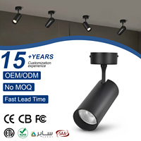 Spot LED COB moderne à montage en surface 9W-20W en aluminium noir réglable pour salon
