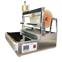 Machine d'emballage de masques en film transparent, boîte cosmétique, machine d'emballage en cellophane