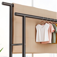 Porte-vêtements sur roulettes à double barre, support à vêtements portable autoportant en métal robuste pour chambre et salon, noir