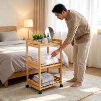 Chariot roulant à 3 niveaux en bambou avec étagères de rangement mobiles et roulettes pour salle de bain, cuisine, buanderie, spa