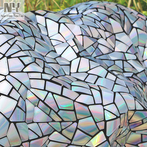 Tela de lentejuelas iridiscente plateada con corte láser de polígono sobre terciopelo de Nanyee Textile - Product Image 2