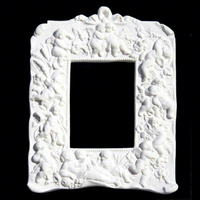 Cadre en marbre naturel avec relief de chérubin