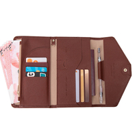 Nouveau paquet de documents de billet en cuir multifonctionnel RFID clip de passeport de voyage à trois volets chaud bien vendu au Japon