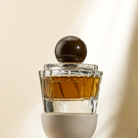 Flacon de parfum en verre délicat en forme de gâteau de 70 ml avec vaporisateur pompe rechargeable vide de luxe