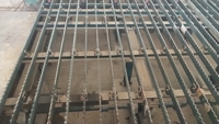 Lit de refroidissement en acier profilé pour laminoir à chaud - Équipement de refroidissement de type rack pour machine à laminer l'acier et ligne de production de barres d'armature
