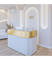 Bureau de réception commercial écologique en pierre artificielle en forme de courbe gracieuse avec éclairage LED pour hôtel et centre commercial