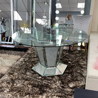 Table basse ronde en verre avec aspect diamant écrasé et base miroir