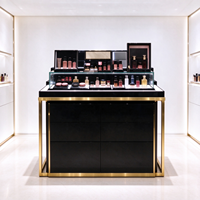Présentoir à parfums noir et or en verre, comptoir îlot, étagères murales, boîte à lumière, affiche CE ETL pour magasin de beauté