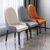 Chaise de salle à manger en cuir rembourrée, style nordique, luxe léger, moderne et minimaliste, tendance, avec dossier en acier, pour la maison et l'hôtel