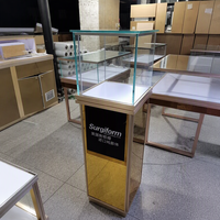 Vitrine de présentation de luxe en aluminium robuste avec éclairage LED blanc et logo personnalisé, dessus en verre pour magasin de détail