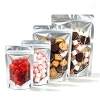 Op maat gemaakte voedselveilige gouden folie stand-up pouch met ritssluiting en venster voor snacks, koekjes, noten, gedroogd fruit, popcorn en voedselverpakkingen.